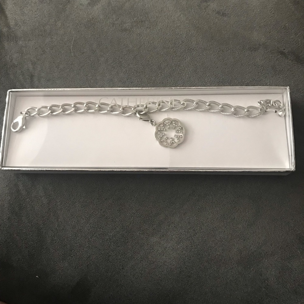 Catherine’s charm bracelet with one winter charm